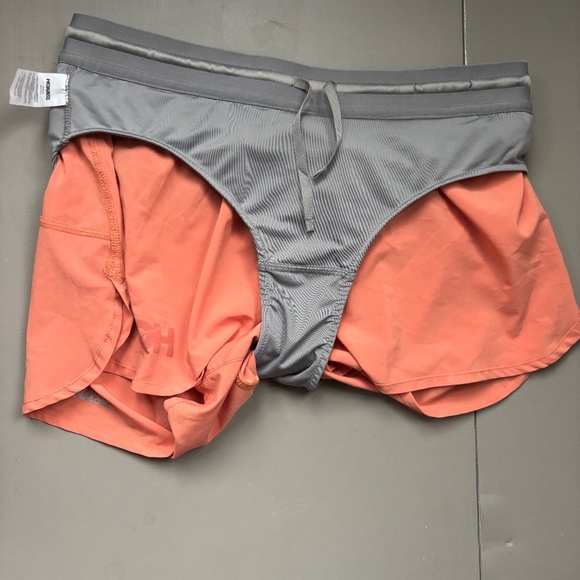 HokA One One SG Trail Short S Pockets Sun Baked Peach Run - Picture 8 of 10